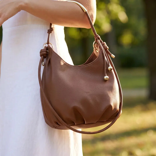 Slouchy Bucket Bag with Curved Bar Handle
